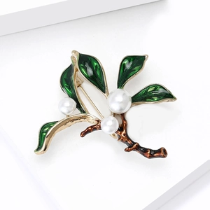 Elegant garden style enamel green leaf brooch with white pearls and gold alloy finish