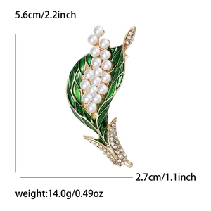Elegant gold lily of the valley brooch with green enamel, pearls and rhinestones
