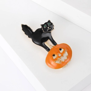 Broche d'Halloween en émail avec chat noir et citrouille, yeux en strass verts
