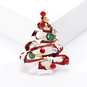 Detail of Christmas tree brooch with enamel finish and sparkling rhinestones