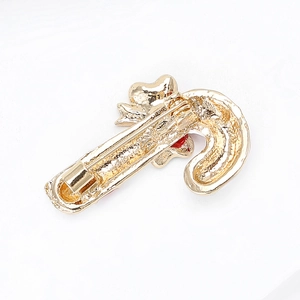 Detailed back view of Christmas candy cane brooch showing secure metal pin fastening