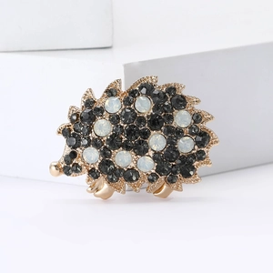Exquisite cartoon hedgehog brooch with rhinestones on a minimalist white background