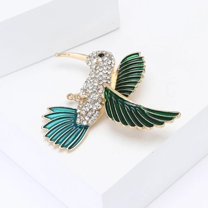 Squisita spilla a colibrì con strass di cristallo e smalto verde su lega dorata