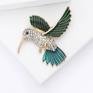 Spilla creativa a forma di colibrì in smalto con strass brillanti su montatura dorata