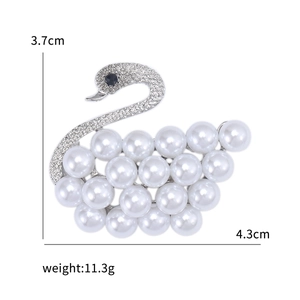 Elegant silver swan brooch with white pearls, sparkling crystals, and 4.3cm width