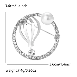 Elegante luchtballon broche met schitterende strass steentjes en witte parel