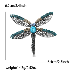 Vintage alloy dragonfly brooch with blue rhinestones and size measurements 6.2x6.4cm