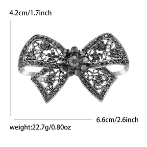 Elegant gun black bowknot brooch with dark grey rhinestones, dimensions 6.6cm x 4.2cm