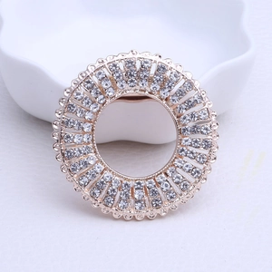 Macro shot of rose gold ring scarf buckle with triple layer of crystal rhinestones