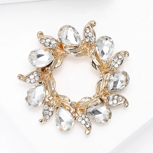 Detail of flower scarf clip with pear-cut crystals and sparkling micro-rhinestones on gold base