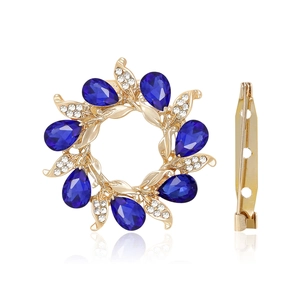 Elegant floral blue crystal wreath brooch with small white rhinestones and gold alloy base