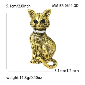 Vintage gold cat brooch with sparkling rhinestone collar and black gemstone eyes