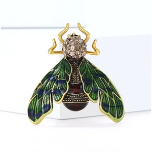 Vintage insect beetle brooch with gold frame and green gradient enamel wings