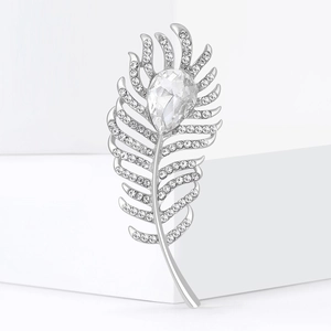 Elegant silver feather brooch with sparkling crystals and a pear-shaped center stone