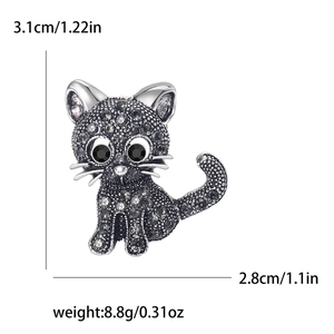 Vintage cat brooch in silver alloy with dark grey rhinestones and size measurements