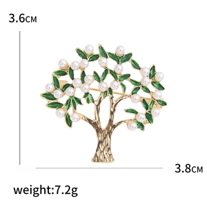 Vintage gold tree brooch with green enamel leaves and white pearls, sized 3.6cm by 3.8cm