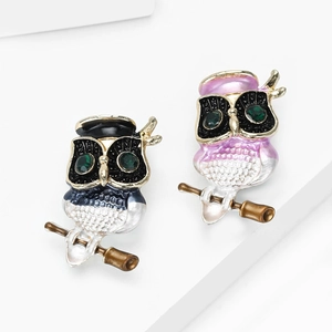 Vintage owl brooches with glasses in blue and pink gradients with green gemstone eyes
