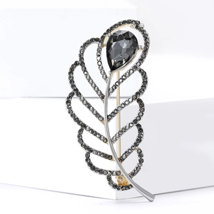 Elegant silver feather brooch with dark grey rhinestones and pear-cut crystal