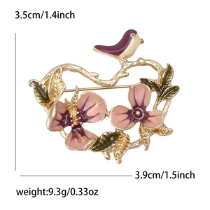 Elegant Chinese style floral and bird brooch with pink flowers and purple enamel bird