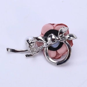 Pink satin rose flower brooch with silver metal leaf and pearl detail from the back view