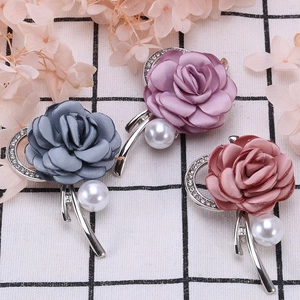 Elegant fabric rose brooches in grey, purple and pink with pearl and crystal details