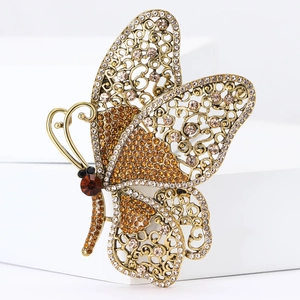 Exquisite vintage butterfly brooch with gold alloy filigree and multicolored crystals