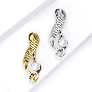 Vintage gold and silver musical note brooches with elegant white pearl accents