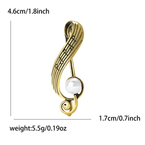 Vintage gold musical note brooch with white pearl detail for suits and shirts