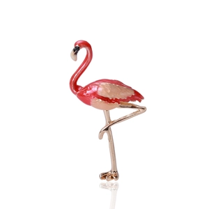 Detailed view of enamel flamingo brooch in rose gold and pink gradient finish