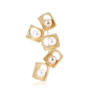 Golden alloy square frame brooch with pearls and matte brushed finish on white background