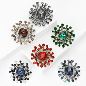 Vintage sunburst brooch collection with vibrant faceted crystals in six assorted colors