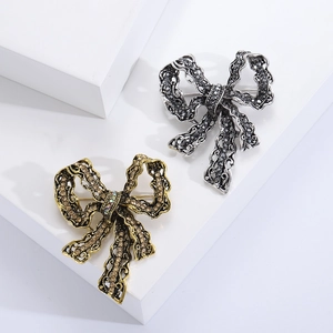 Vintage Alloy Rhinestone Bowknot Brooch Elegant Hollow Out Bow Pin For Women Apparel Decoration Accessory Gold Silver