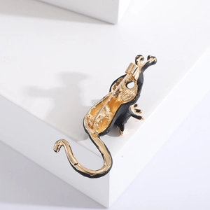 Wild leopard animal brooch with black enamel coating and golden finish in creative design