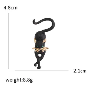 Creative black wild cat brooch with gold whiskers and green rhinestone eyes, 4.8cm height