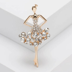 Broche danseuse de ballet en strass étincelants et dorure sur socle en pierre blanche
