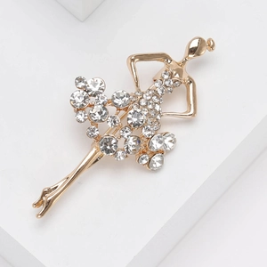 Broche ballerine élégante plaquée or avec cristaux scintillants sur base géométrique