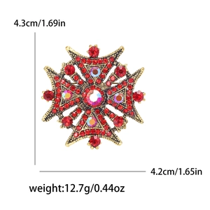 Vintage Maltese cross brooch with red rhinestones and antique gold finish, 4.3cm diameter
