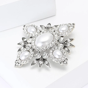 Vintage baroque alloy brooch with large oval pearls and sparkling rhinestones for women