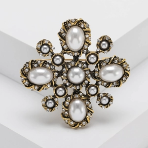Baroque vintage sunburst cross brooch in antique gold with pearls and sparkling rhinestones