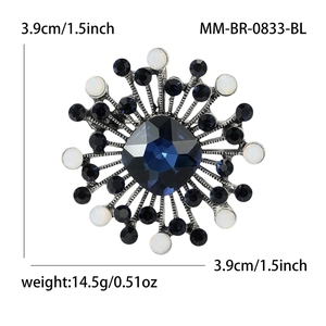 Vintage starburst brooch with deep blue crystal center and 3.9cm measurement detail