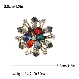 Detail showing vintage flower brooch dimensions 3.8cm and colorful gemstone inlay