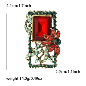 Detailed macro view of baroque red crystal brooch with precise size measurements in cm