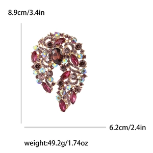 Detailed view of luxury large brooch with purple crystals and 8.9cm x 6.2cm measurements