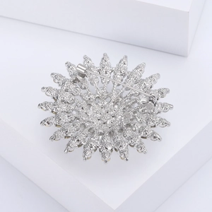 Detailed back view of a silver sunflower brooch featuring an intricate镂空 design and pin clasp