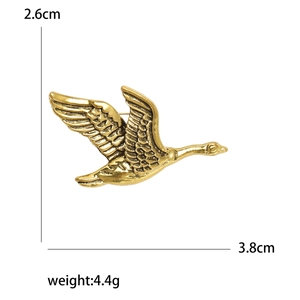 Broche vintage en métal doré en forme d'oie volante avec dimensions et poids précis