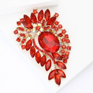 Vintage gold brooch with large red faceted stone and rhinestone flower cluster for suits