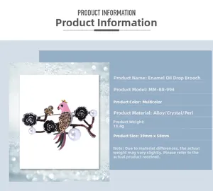 Macro view of bird brooch with black flower, rhinestones and pearls, size 39mm by 58mm