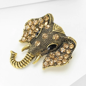 Vintage elephant brooch in antique gold finish with champagne rhinestones for women