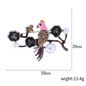 Vintage bird brooch with rhinestones, pearls and black flowers on a branch, 58mm wide