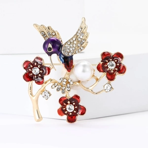 Exquisito broche de flor de colibrí esmaltado con perlas y cristales en base minimalista